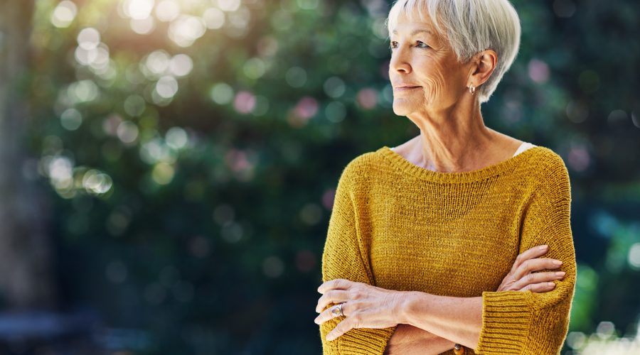 Shot of a confident senior woman looking thoughtful outdoors