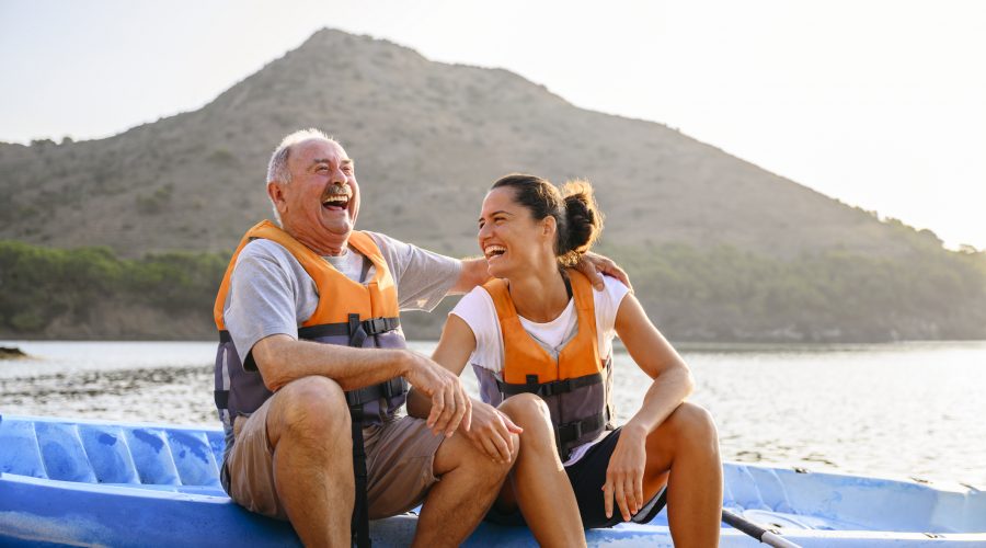 Spanish male and female enjoying early morning kayaking